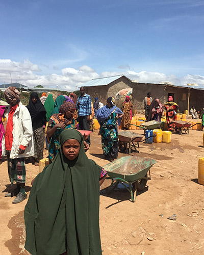 Image of young woman in refugee camp during cholera outbreak. Photo: Anu Rajasingham, CDC.