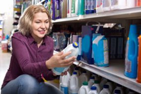 women looking at household cleaning products