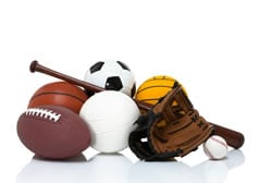 sports-ThinkstockPhotos-499130315.jpg Sports equipment such as a football, baseball, and soccer ball.