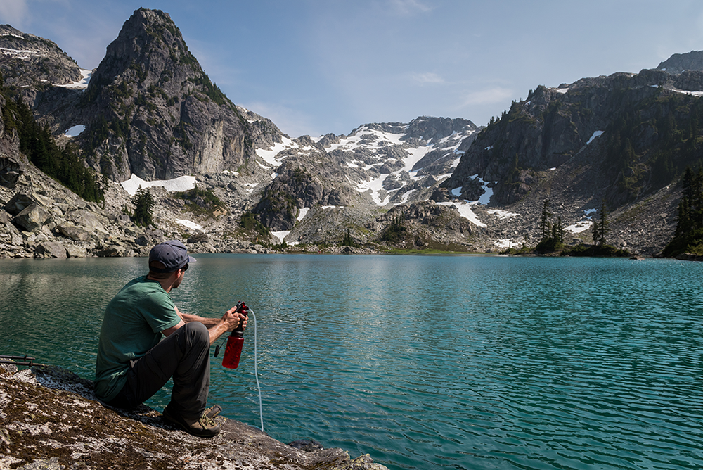 Water Treatment Options when Hiking, Camping or Traveling Man fishing on a lake