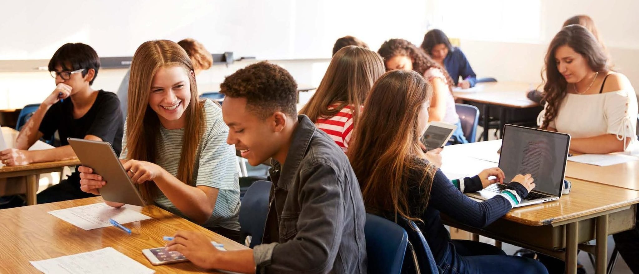 a multiracial group of students in the classroom