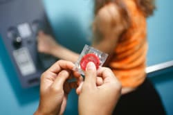 prevention_programs_condoms_250x166.jpg image of a wrapped condom