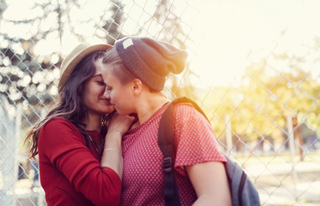 Image of two young women embracing