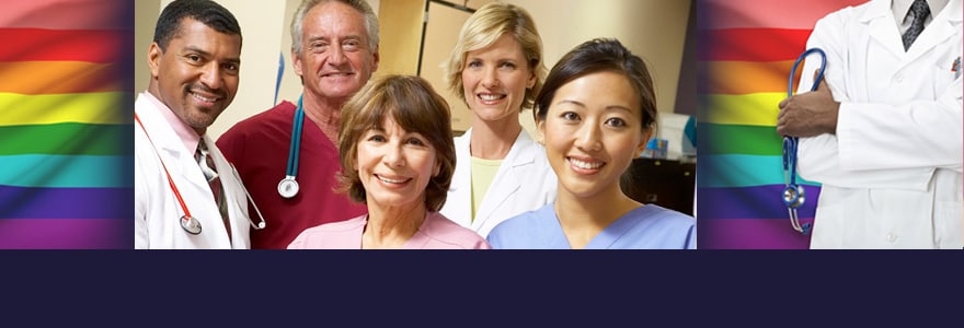 Five diverse health care providers looking straight ahead and smiling and African American male clinician holding a stethoscope and standing in front of an LGBT pride flag