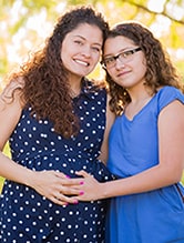 iStock_37245706_pregnant-women Hispanic pregnant women and her daughter