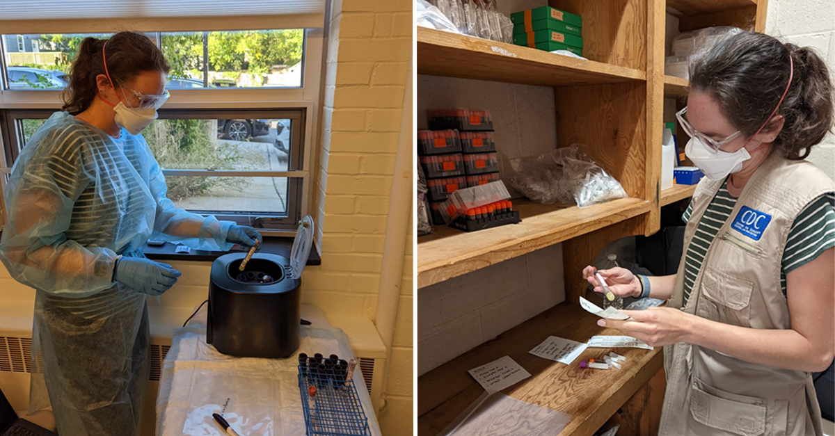 Women on left wearing blue PPE, lab goggles, mask, and blue surgical gloves working in lab. Woman looking at lab specimen.