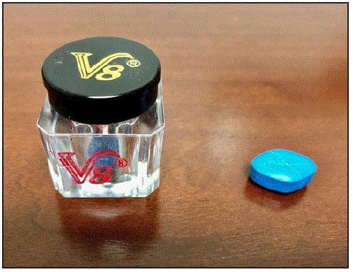 mm6924a3-F The figure is a photo showing a jar of “V8,” a male enhancement supplement purchased from a convenience store in Virginia in 2019 and one of the blue tablets from the jar.
