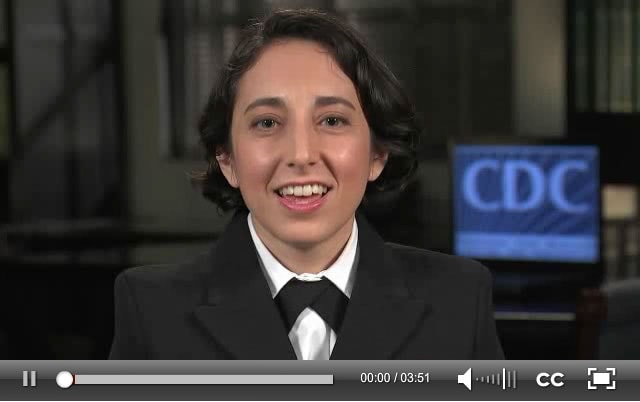 Close-up of Dr. Cristina Cardemil, MD, with a CDC logo in the background