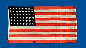 1960 The First American Flag flown over CDC Headquarters is all wool and measures 60″ high by 114″ wide.