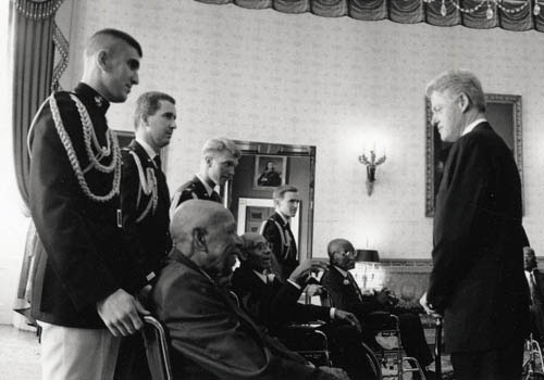 story-of-cdc-tuskegee-clinton-apology President Clinton with the survivors at the White House
