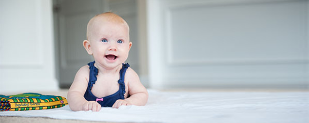 newMilestone_matters_updated Baby lying on ground