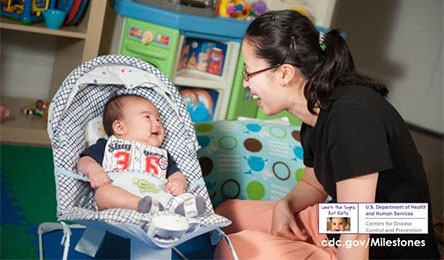 mom&baby mother smiling at a smiling baby