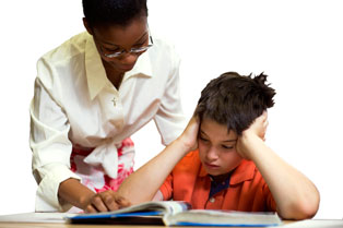 adhd-conditions1.jpg_4261a Teacher working with student