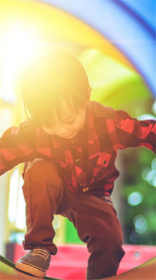 boy-on-slide-2 boy on a park tunnel