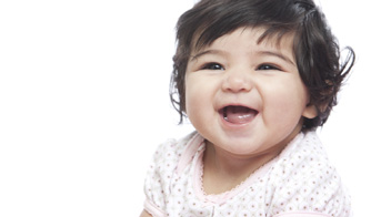 Birth to 5: Watch Me Thrive! A baby smiling