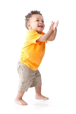 toddler-boy-yellow-shirt-300px.jpg A happy toddler boy