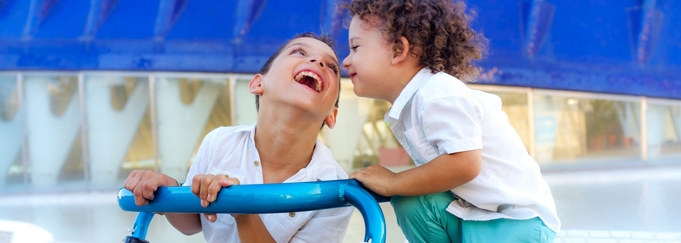 A brother and sister playing together