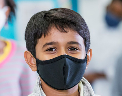 Boy wearing a mask