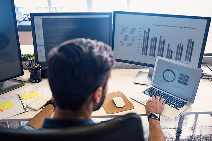 Man creating data reports