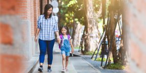 Mother and daughter walking