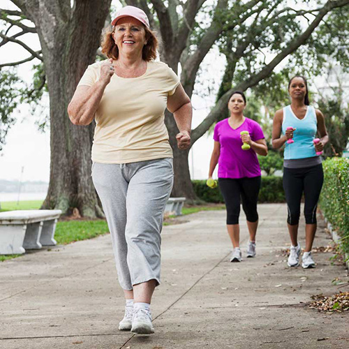 Three women walking outside