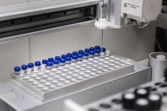 Photo of vials being prepared for laboratory studies
