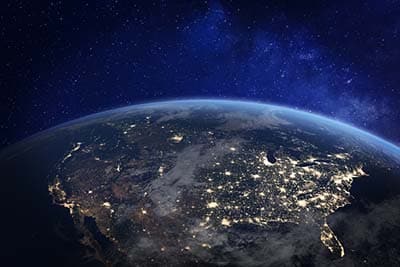 North America at night viewed from space with city lights showing human activity in United States (USA), Canada and Mexico, New York, California, 3d rendering of planet Earth, elements from NASA 