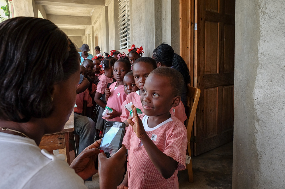 Division of Parasitic Diseases and Malaria Woman with Haitian kids