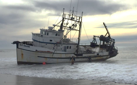 fishing-vessel Commercial fishing vessel Day Island on Ventura Beach, California, after grounding resulting from human fatigue.