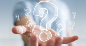 Hand with question marks Out stretched hand with illstruated questin marks