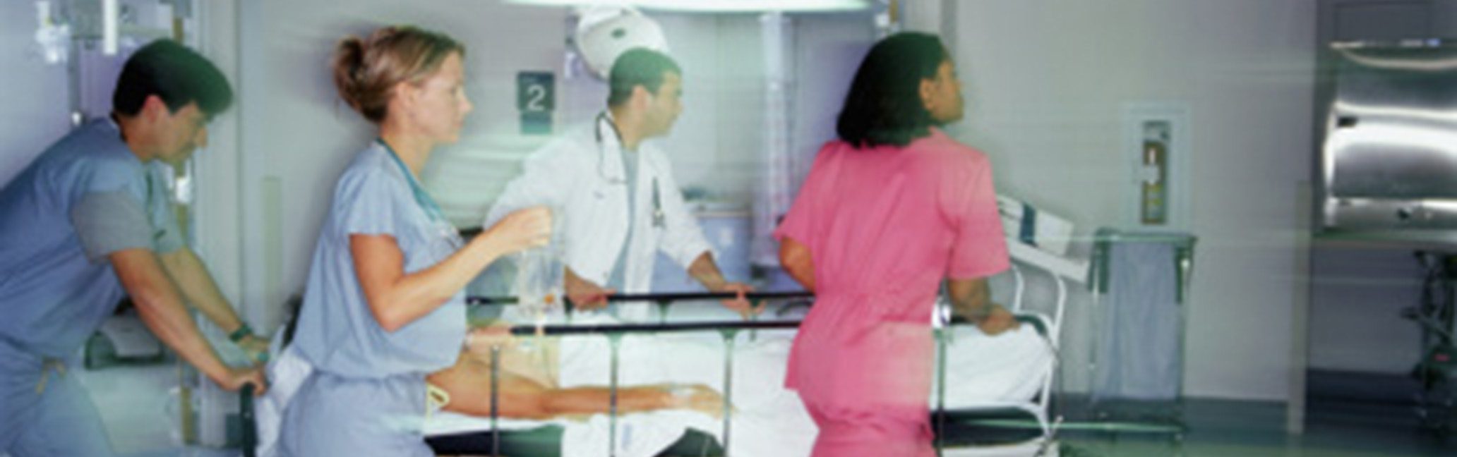 Health Providers with patient on gurney Health Providers with patient on gurney