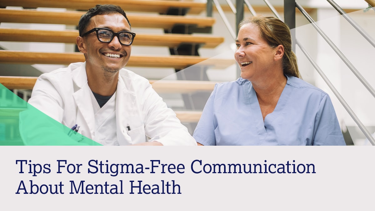 Tips for Stigma Free Comms Hero Two smiling healthcare workers with text "Tips for Stigma-Free Communication About Mental Health."