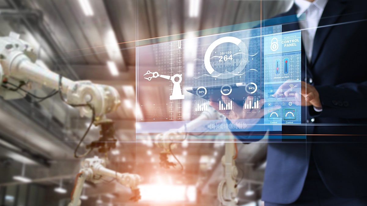 — title missing — Manager industrial Engineer using tablet check and control automation robot arms machine in intelligent factory industrial over system on virtual interface screen, Industry 4.0 concept. Photo by Getty Images
