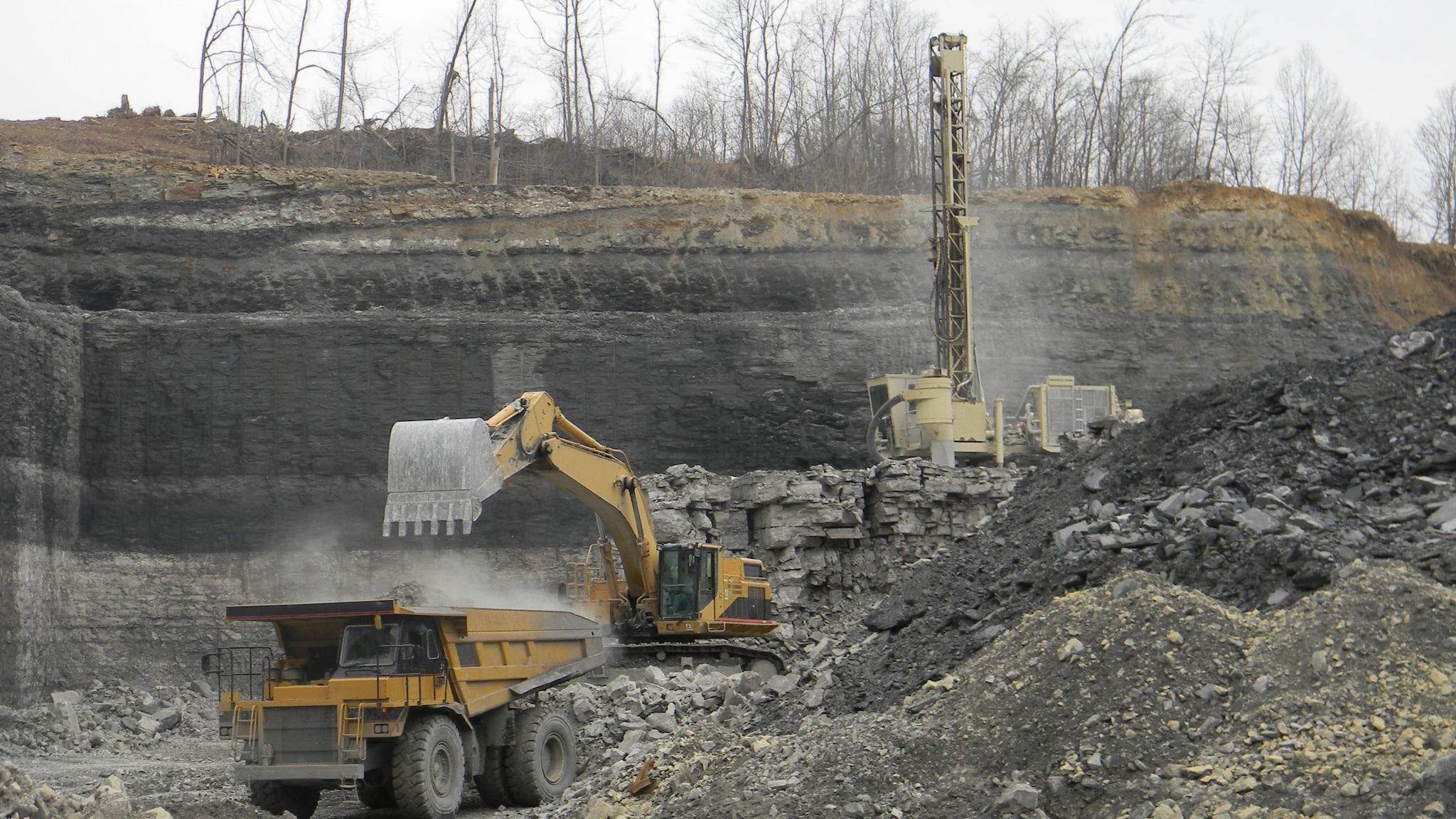 — title missing — Haul truck loader and rotary drill at surface mine - Photo by NIOSH - Organiscak 2018 IC cover