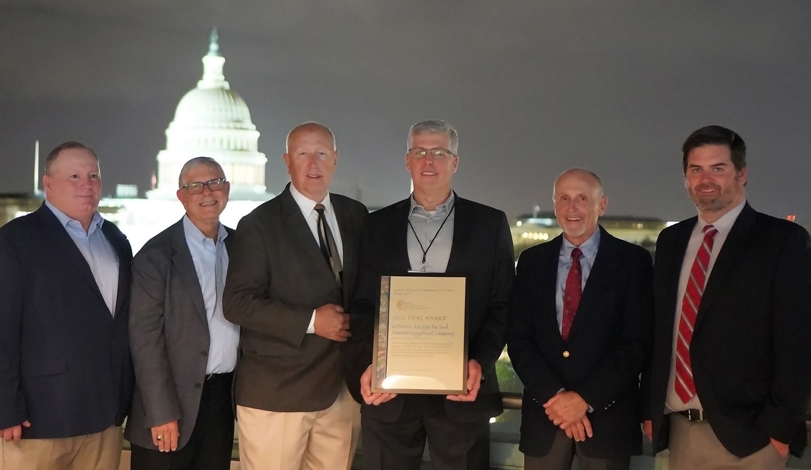 2022 Coal Award Winners CONSOL Energy pose with their award certificate.