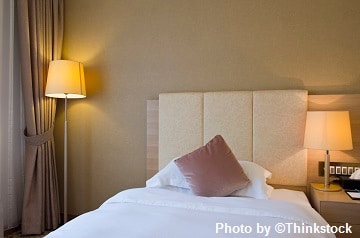 M7B A photo of a bed in a bedroom