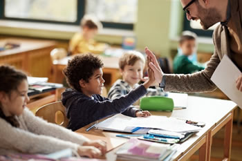 Children and teacher in classroom