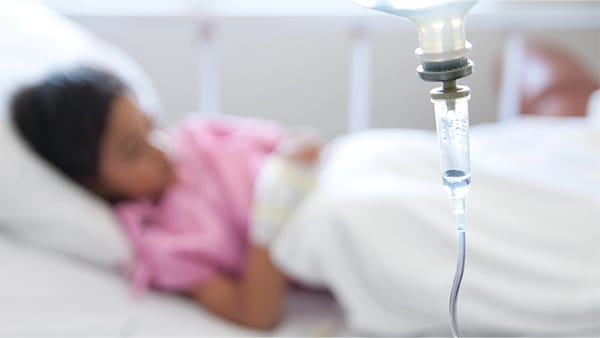 Child-in-hospital-bed Child in hospital bed