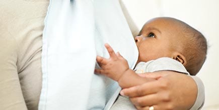 breastfeeding-mom Mom breastfeeding her baby.