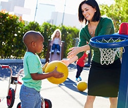 Join Us! Children and teacher on a playground