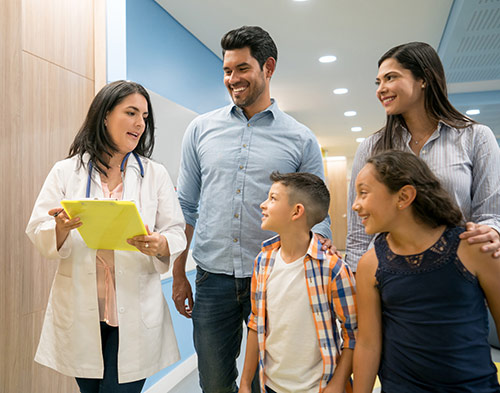 Medical professional talking to a family