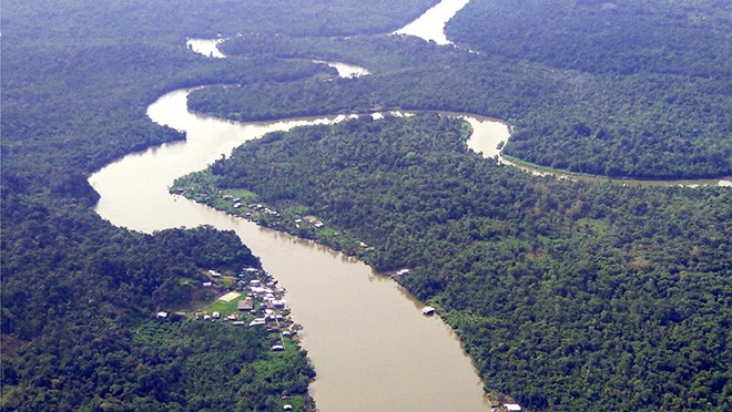 Localities-Cauca-Colombia-by-Raul-Pardo Arial view of the Cauca region, showing a winding river and a heavily forested area.
