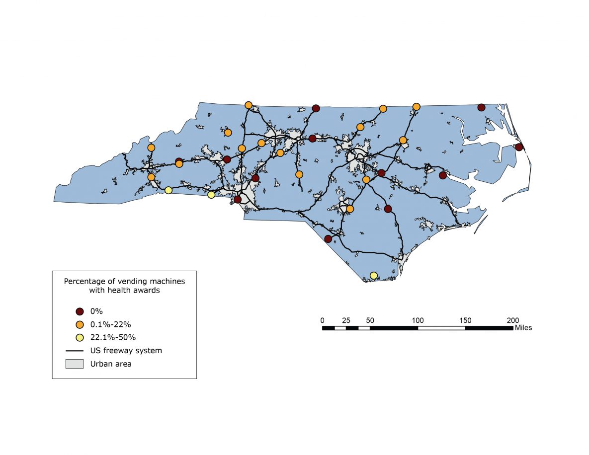 19_0129_01 Map of highway rest area locations serving food and/or beverages in vending machines, North Carolina (N = 30). Each location was categorized as bronze, silver, gold, or no award, on the basis of criteria established by the Nutrition Environment Measures Survey–Vending (11). US Census Bureau–designated urban areas and the US freeway road network are also indicated.