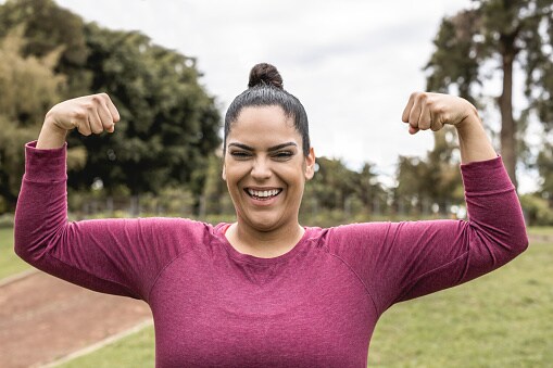 Woman flexing her muscles