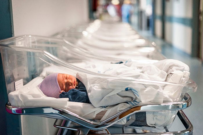 Newborn baby in a small hospital beds Newborn baby in a small hospital beds