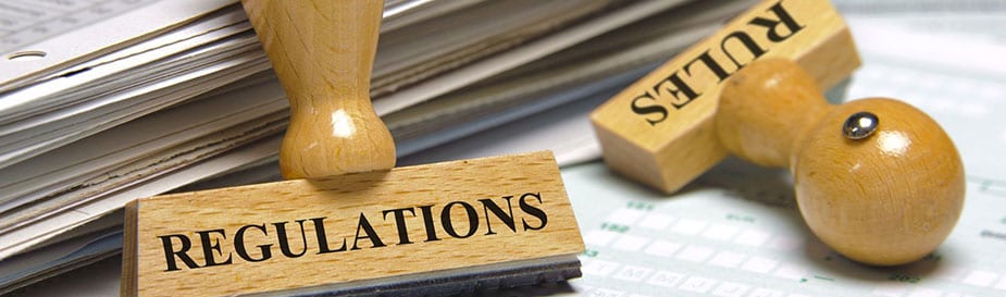 rubber stamps marked with regulations and rules 