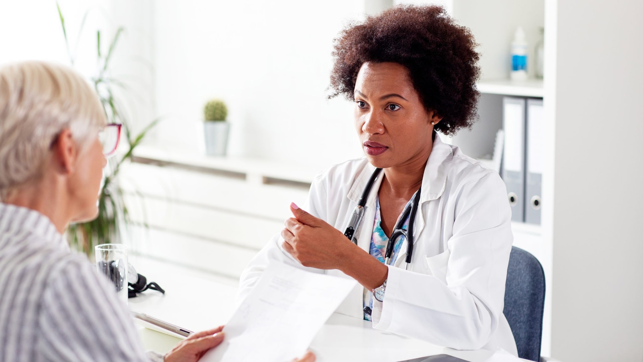 Mature Woman with Doctor Mature Woman with Female Doctor