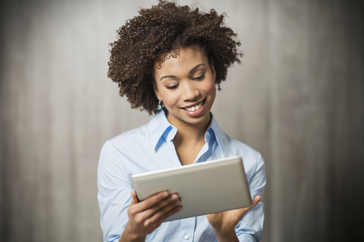 Fact Sheet woman looking at tablet