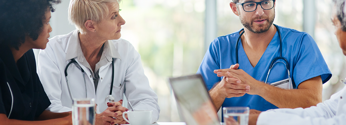 professionals meeting at table