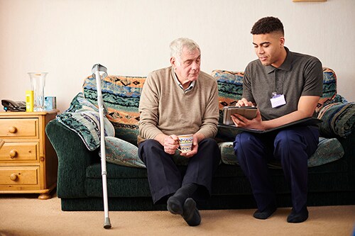 support worker with client support worker with client
